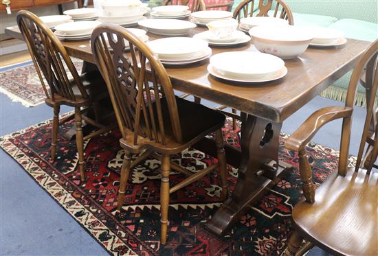 An oak refectory table by Jaycee and six chairs, table 184cm long